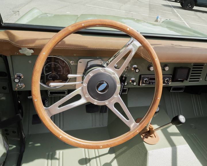 Custom steering wheel and body-color dash in the 1967 Bronco