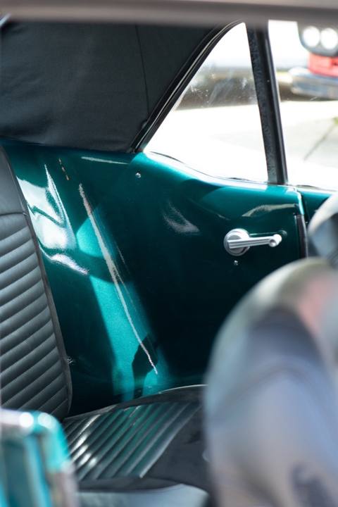 Door panel and green interior trim in the 1967 Mustang