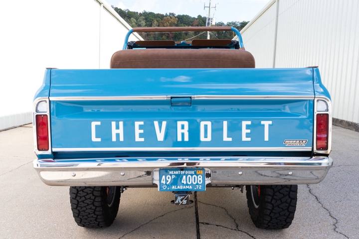 Rear of the light blue 1972 K5 Blazer with its CHEVROLET tailgate and taillights