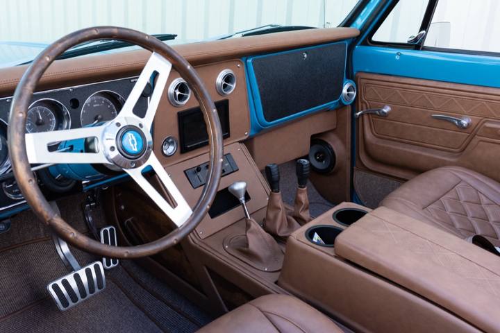 Custom interior, steering wheel, and center console in the light blue 1972 K5 Blazer