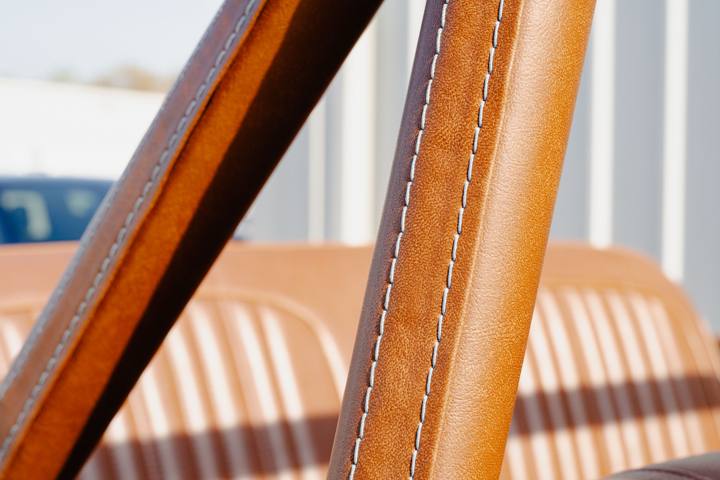 Custom leather roll-bar covers in the silver 1972 K5 Blazer