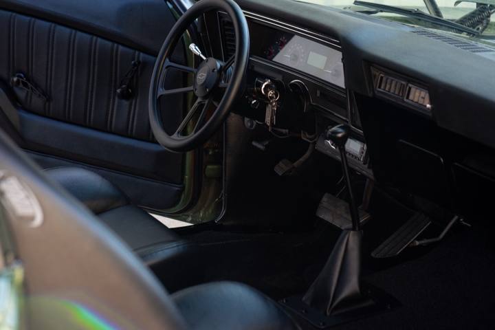 Black interior and steering wheel in the 1973 Nova