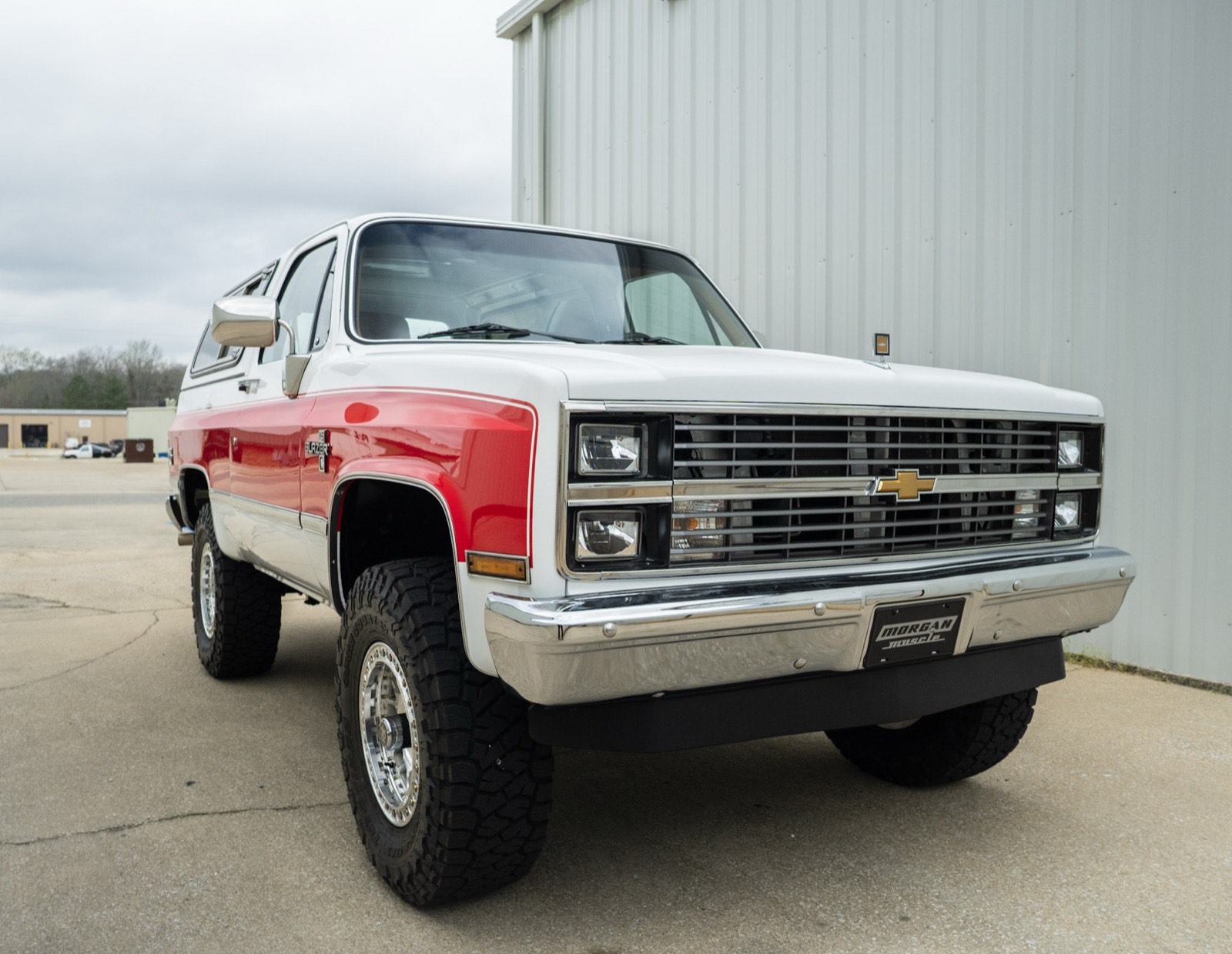 1984 Chevrolet K5 Blazer in red and white two-tone, restored by Morgan Muscle Cars in Pelham, Alabama