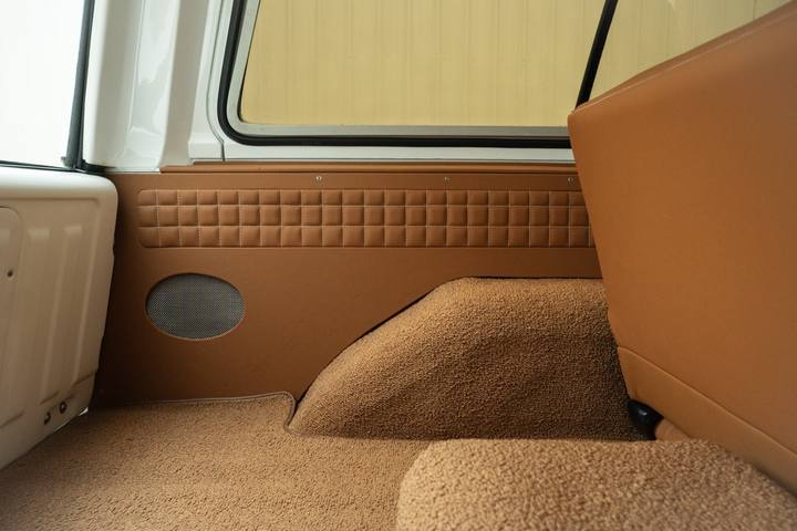 Tan carpet and custom side panels in the cargo area of the 1984 K5 Blazer